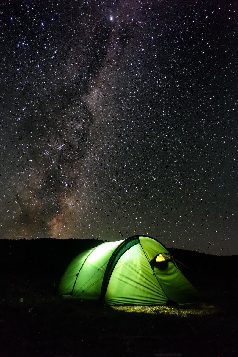 green tent under starry night