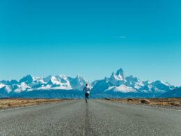 person running on road at daytime