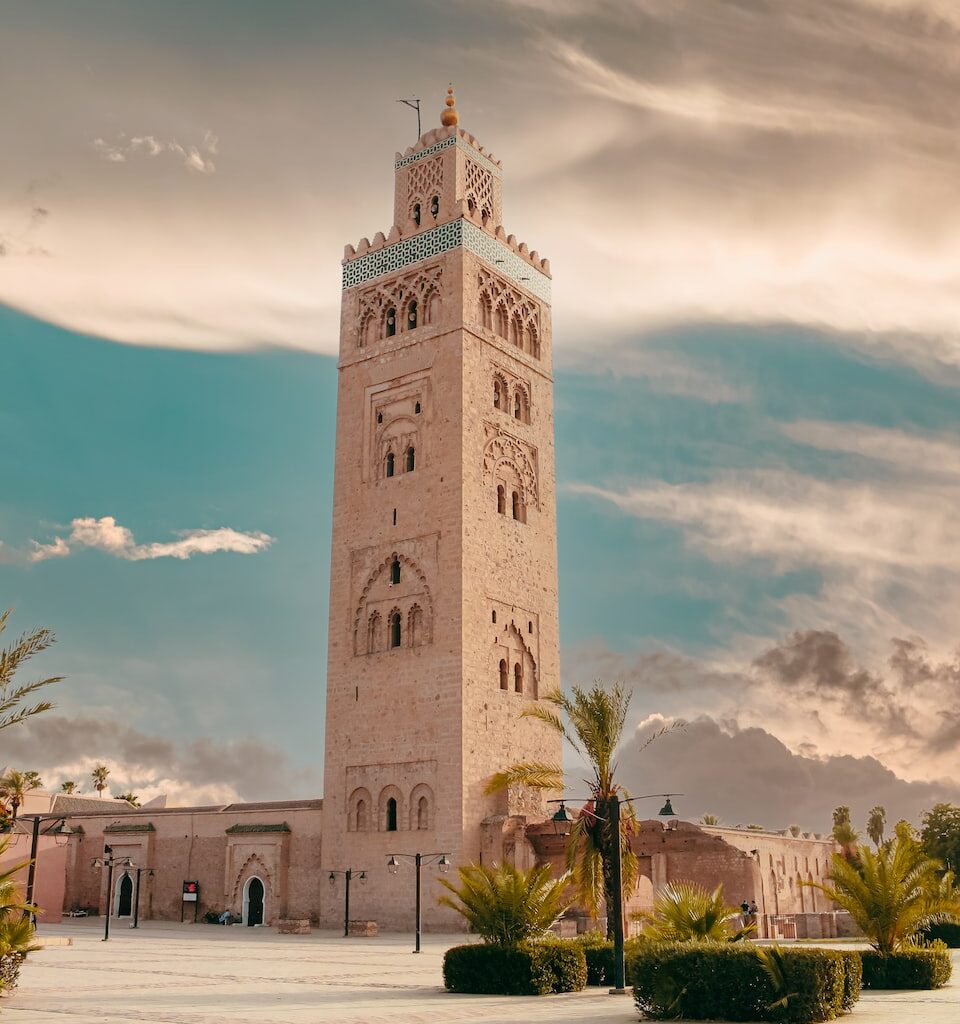 a tall tower with a clock on the top of it